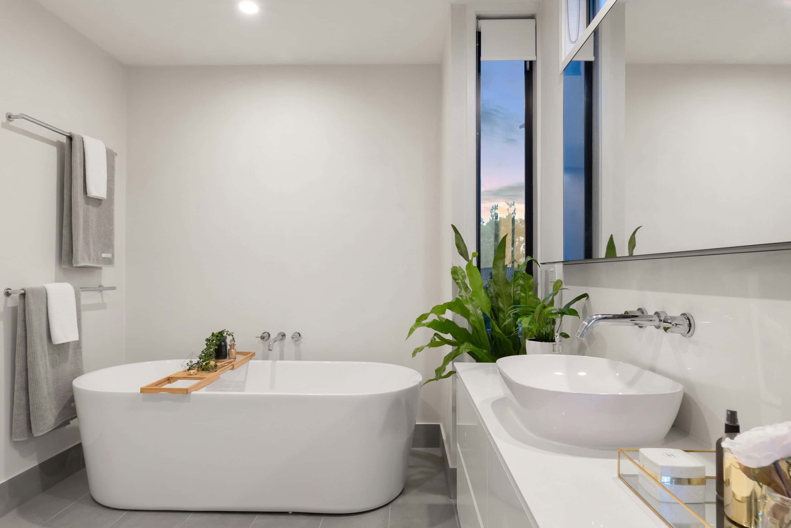 Reference image of a freestanding bathtub in a bright bathroom